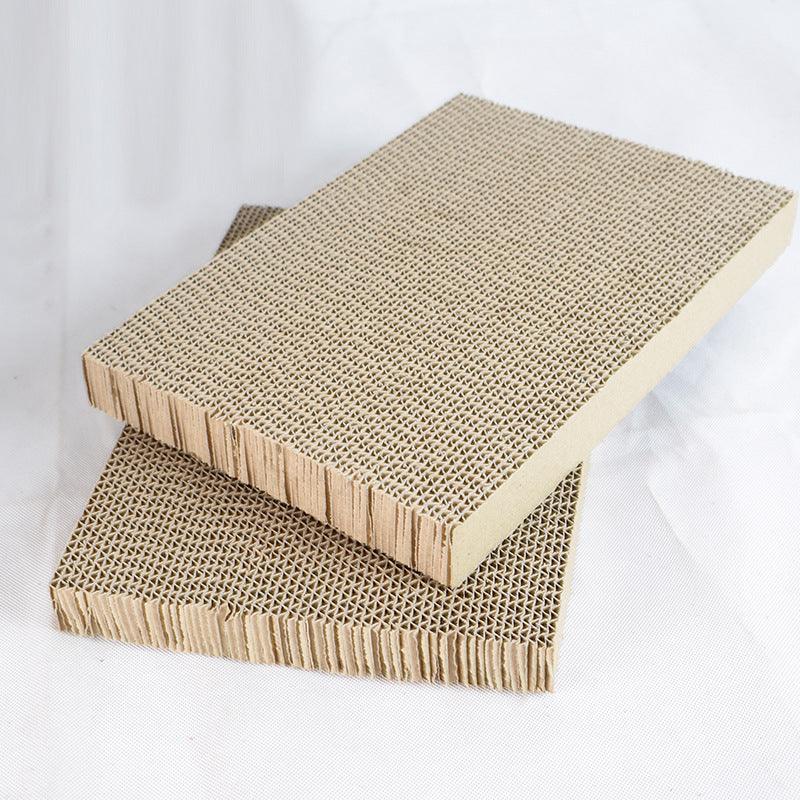 Two cardboard scratchers with textured sides on a white background