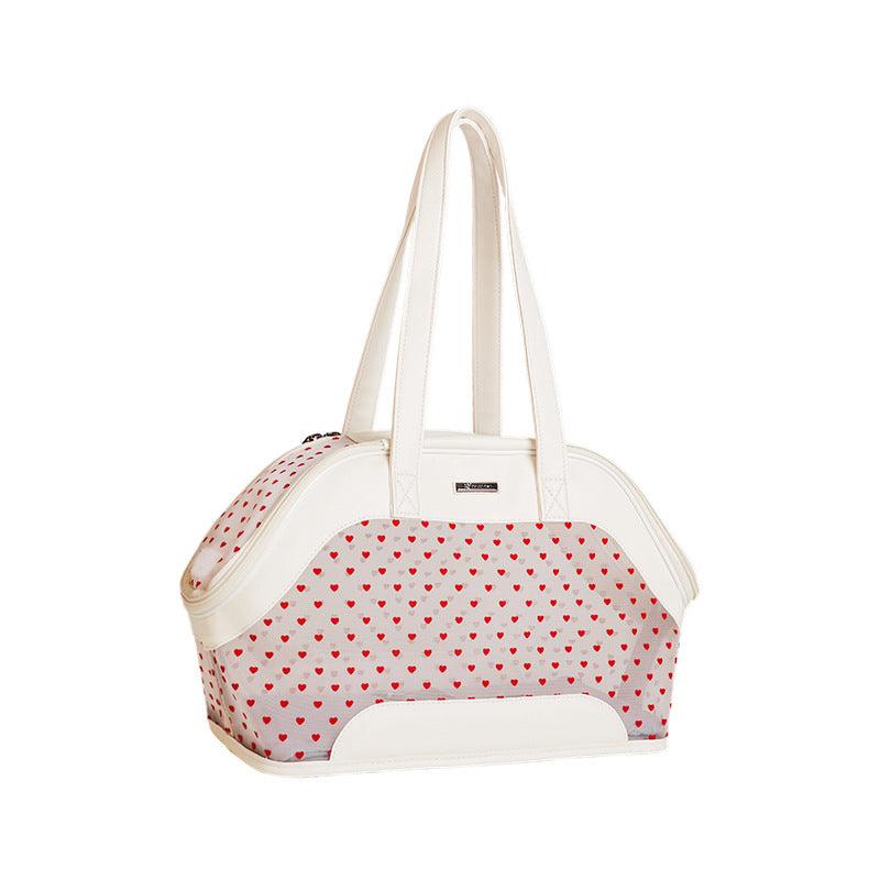 White pet carrier with red heart mesh pattern on a white background