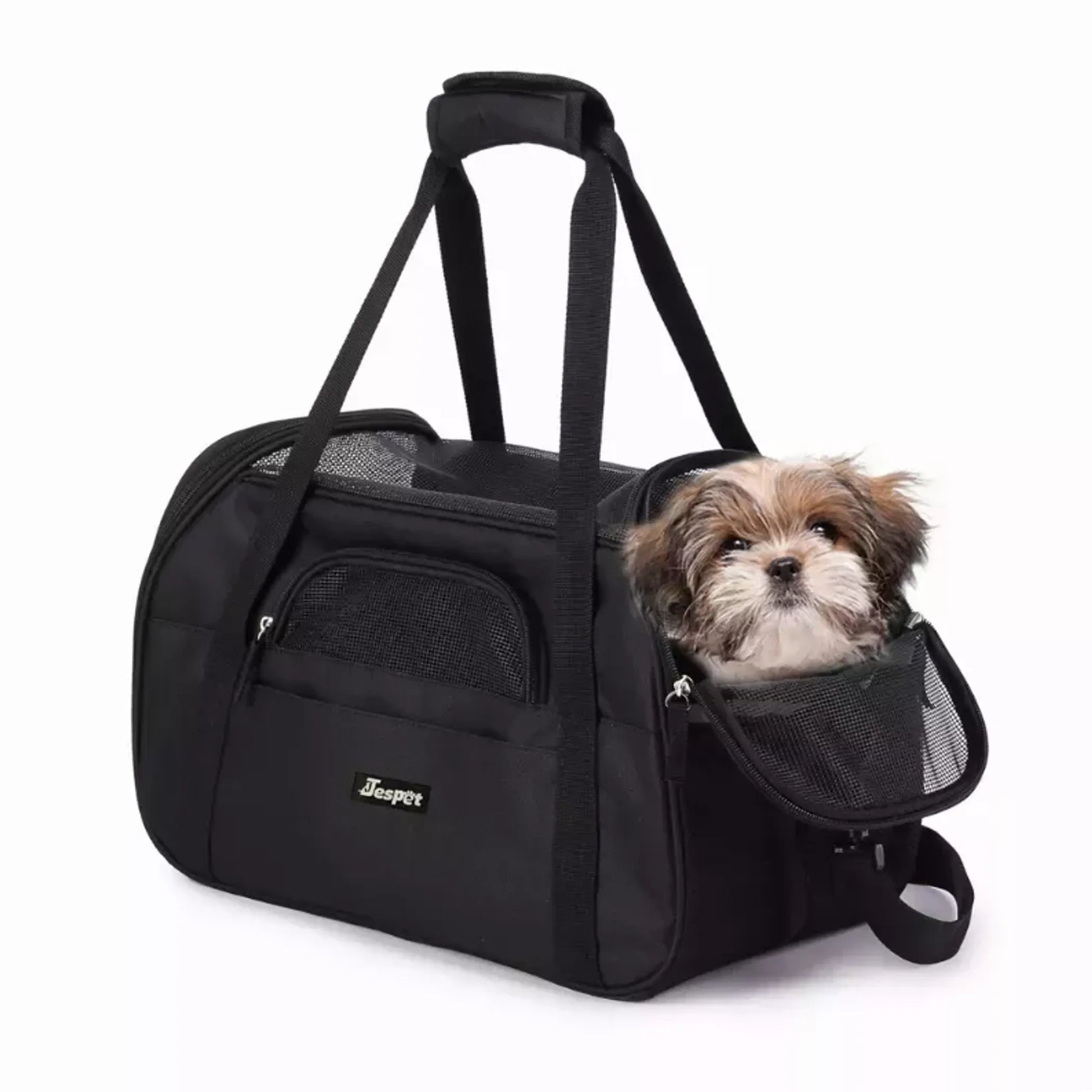 Dog in black jesper soft sided pet carrier