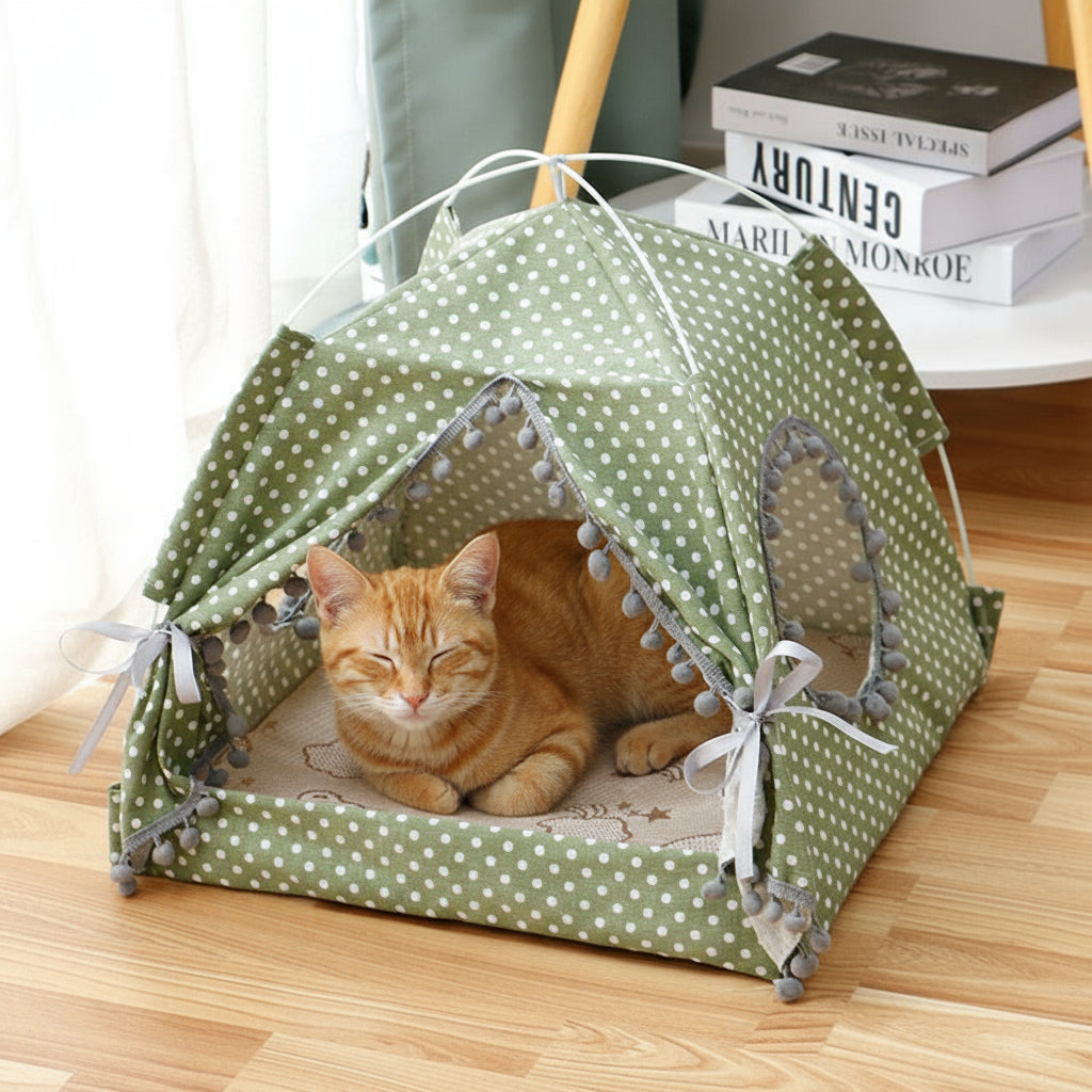 Green polka dot cat tent with beige inner bed
