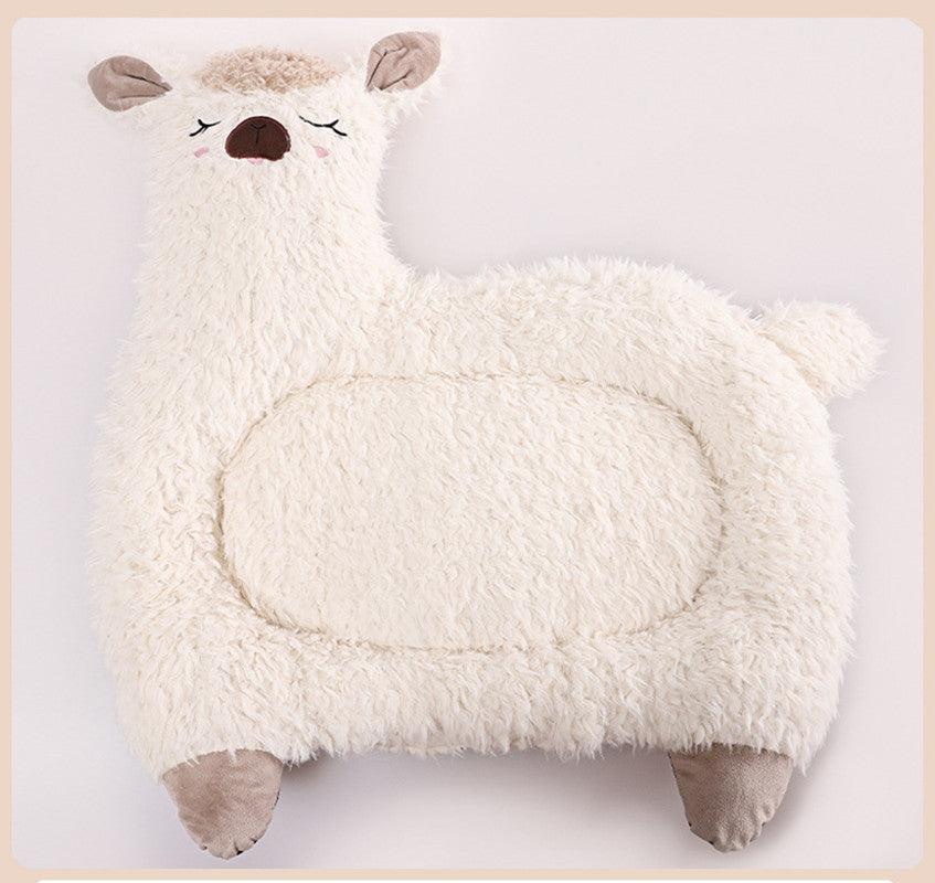 Plush mat shaped like a llama on a light gray background