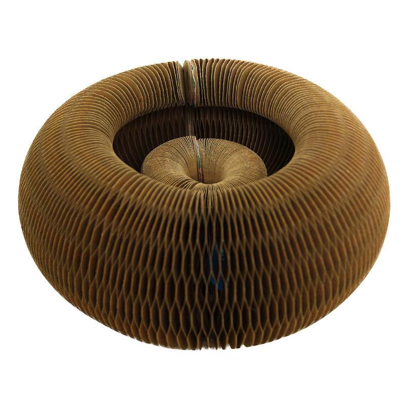 Brown ribbed scratcher on a white background