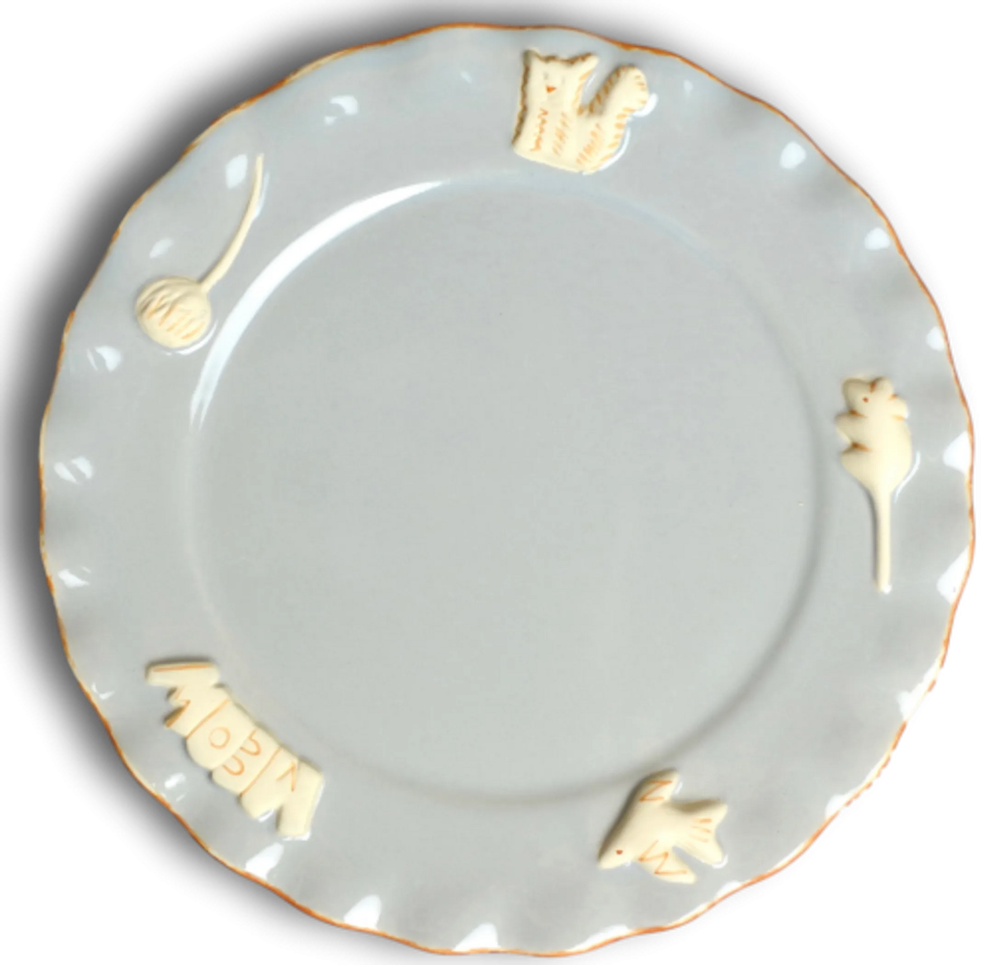 Decorative plate with white embossed designs on a light blue background
