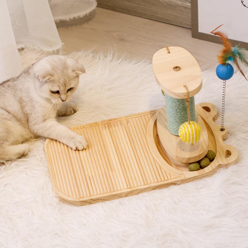 Cat playing with a wooden toy on a fluffy white rug