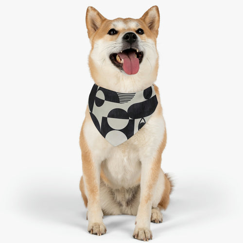 happy dog wearing black and white abstract bandana