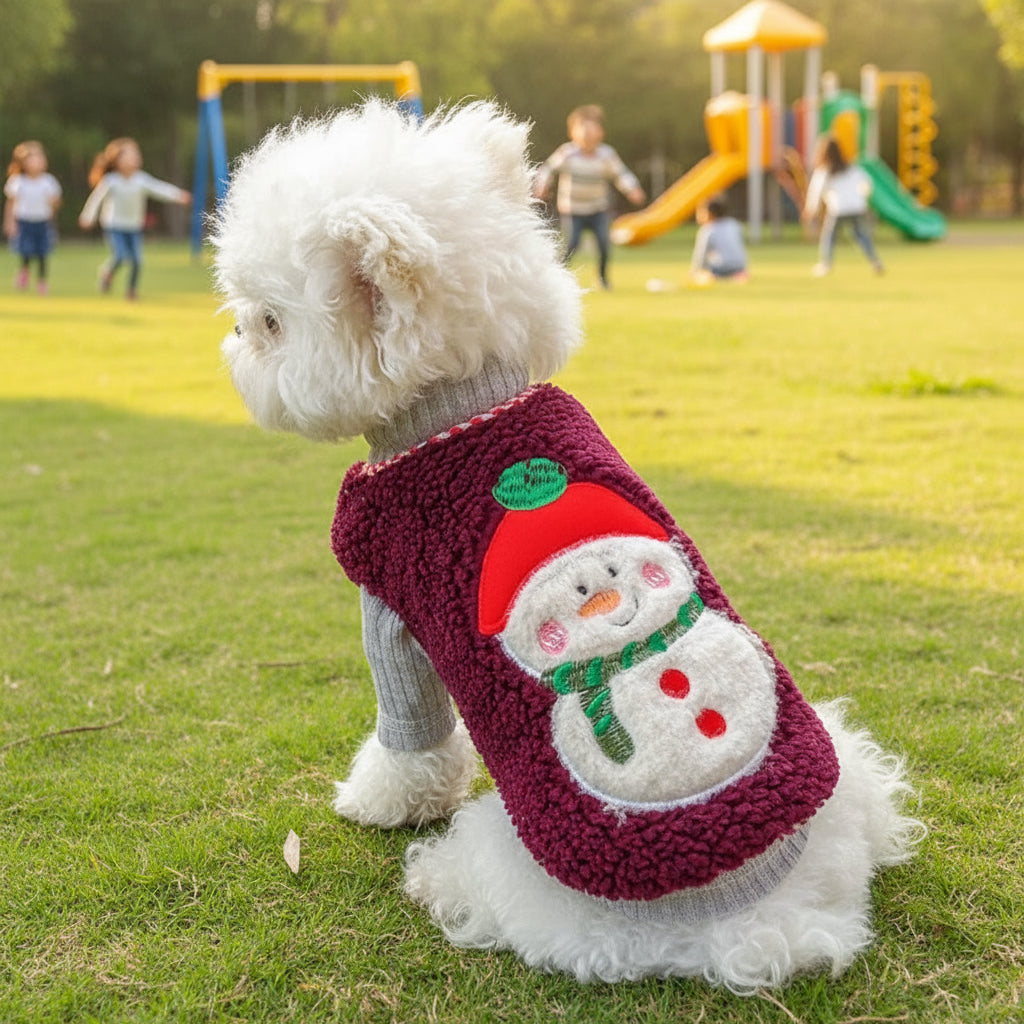 white dog in  Pets Sweater Christmas Special Collection sitting outside watching children play